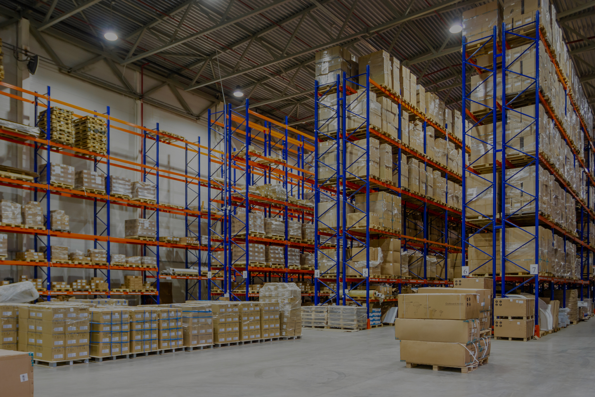 Spacious,Warehouse,Interior,With,Tall,Racking,Systems,Displaying,Stacked,Pallets